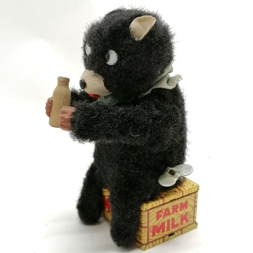 105 - Vintage Toy Nomura wind up Hungry Cub 15cm high with original box - in good condition apart from som... 