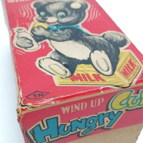 105 - Vintage Toy Nomura wind up Hungry Cub 15cm high with original box - in good condition apart from som... 