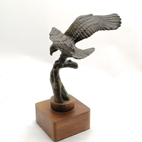 108 - Bronze cast eagle by S A Efron on a wooden base 25cm high wing span 22cm