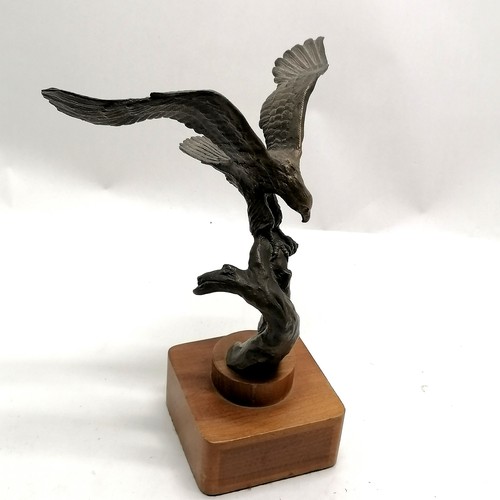 108 - Bronze cast eagle by S A Efron on a wooden base 25cm high wing span 22cm