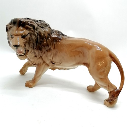 110 - Large Beswick male snarling lion figure 26cm long x 17cm high - No obvious damage