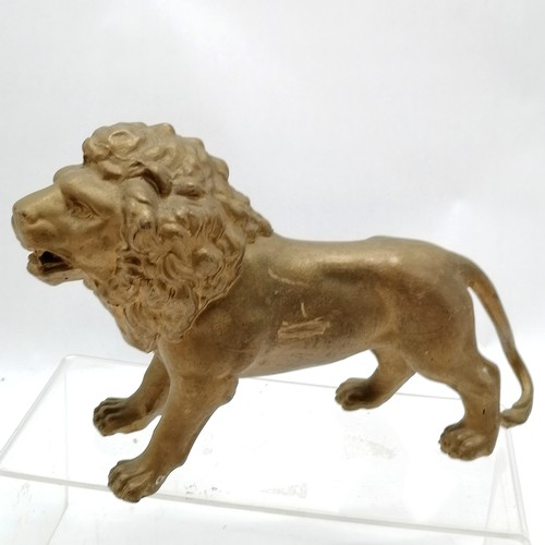 116 - Cast metal gold painted figure of a lion 23cm long, pair of metal lions, Felis Leo ceramic lion and ... 