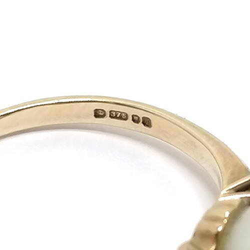 506 - 9ct hallmarked gold pearl and diamond shoulder set ring size O t/w matched 9ct hallmarked gold pearl... 