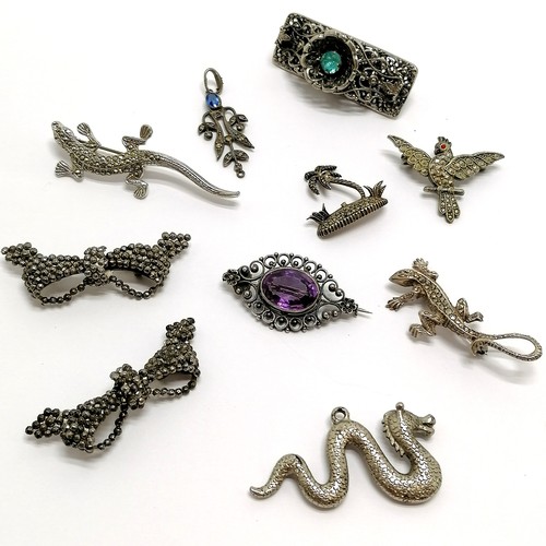 508 - Qty of mostly brooches inc marcasite stone set lizard, Nessie pendant, amethyst unmarked silver broo... 