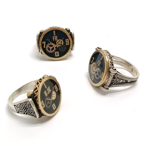 511 - 3 x silver novelty rings with watch part detail size Y / Y½ - 49g total weight