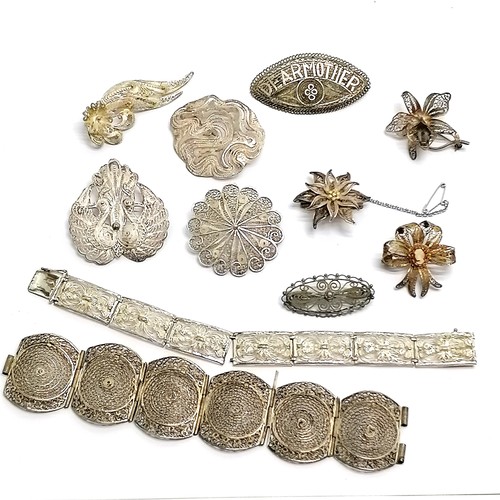 512 - Qty of silver filigree jewellery (some unmarked) inc hand carved cameo etc - total weight 94g ~ brac... 
