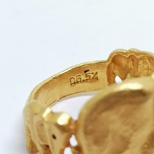 526 - Asian 96.5% marked gold ring with interlocked 4 elephant detail - size M & 9.6g