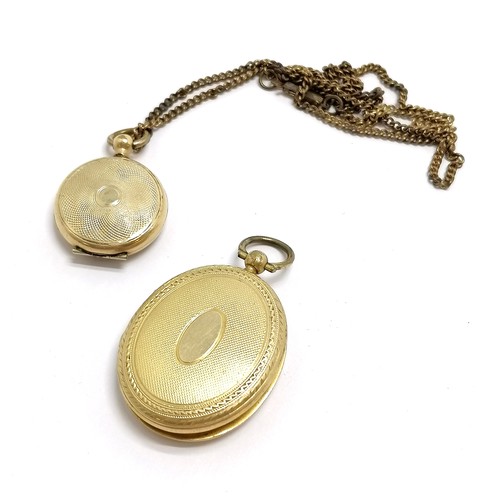 531 - 2 x antique gilt metal lockets (largest 4.5cm) - both have slight dents