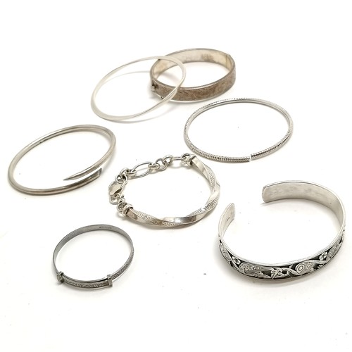 750 - 7 x silver bangles inc ½bangle/½bracelet, bangle by Pe set with blue diamond, 1 bangle (a/f) - total... 