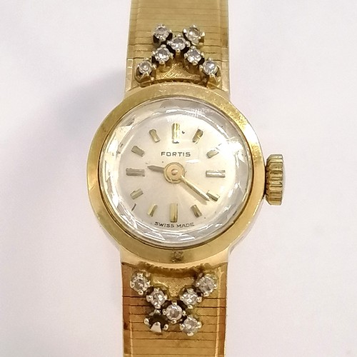 764 - Fortis 18ct gold diamond set manual wind ladies wristwatch (#5398) with integral flush adjustable br... 