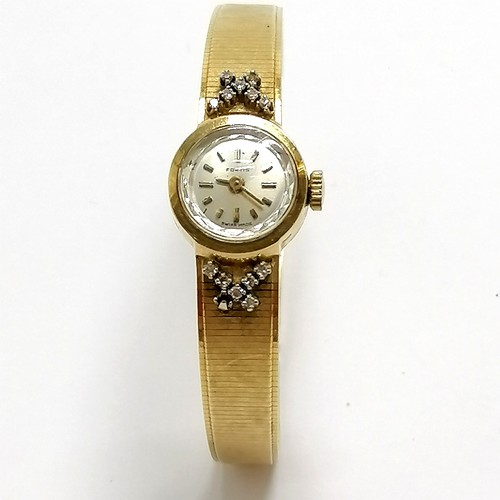 764 - Fortis 18ct gold diamond set manual wind ladies wristwatch (#5398) with integral flush adjustable br... 