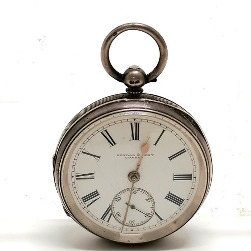 771 - Antique Kendal & Dent silver cased pocket watch - 50mm diameter & has hairline to dial but runs & WE... 