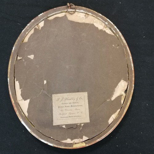 2 - Antique oval oil on board of a girl holding flowers in original frame 24cm x 21cm - some slight loss... 