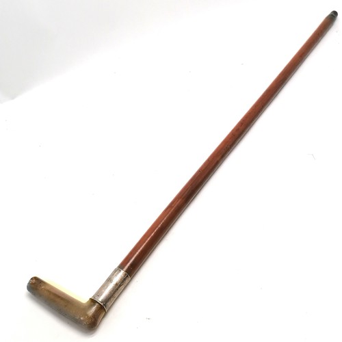 21 - Antique unmarked silver and horn handled Malacca walking stick 86cm long- some splits to the silver ... 