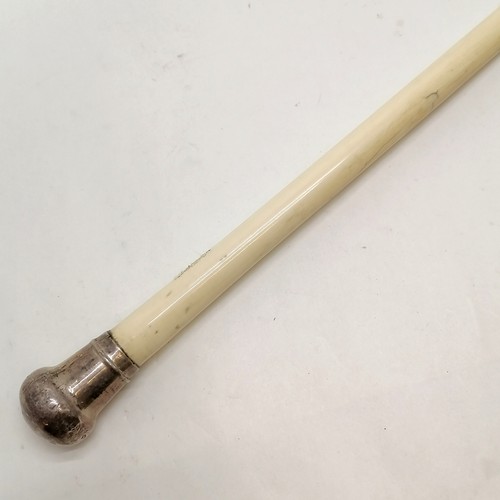 25 - Antique carved bone walking cane in 3 sections with silver hallmarked handle 84cm long
