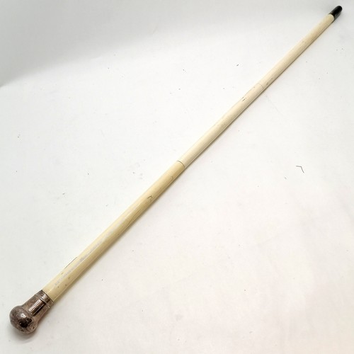 25 - Antique carved bone walking cane in 3 sections with silver hallmarked handle 84cm long