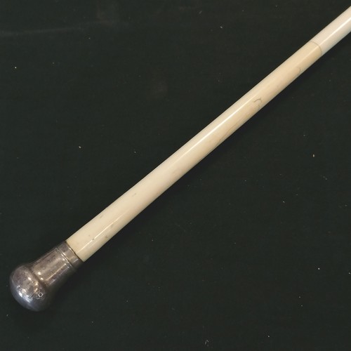 25 - Antique carved bone walking cane in 3 sections with silver hallmarked handle 84cm long