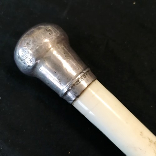 25 - Antique carved bone walking cane in 3 sections with silver hallmarked handle 84cm long