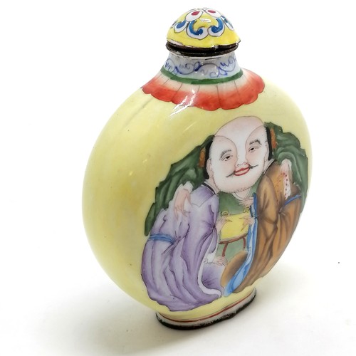 31 - Oriental unusual enamel yellow grounded snuff bottle with metamorphic image and script to base - 7cm... 