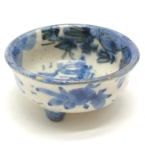 43 - small blue and white Chinese pottery bowl on 3 circular feet 7cm diameter x 3.5cm high- small losses... 