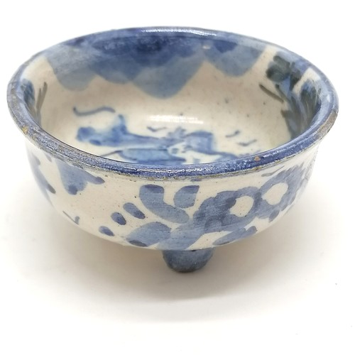 43 - small blue and white Chinese pottery bowl on 3 circular feet 7cm diameter x 3.5cm high- small losses... 