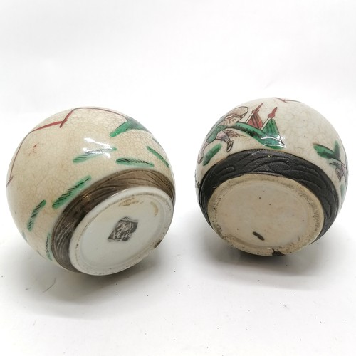 45 - 2 x Chinese ginger jars with crackle glaze depicting warriors in conflict - 9cm high & 1 bears marks... 