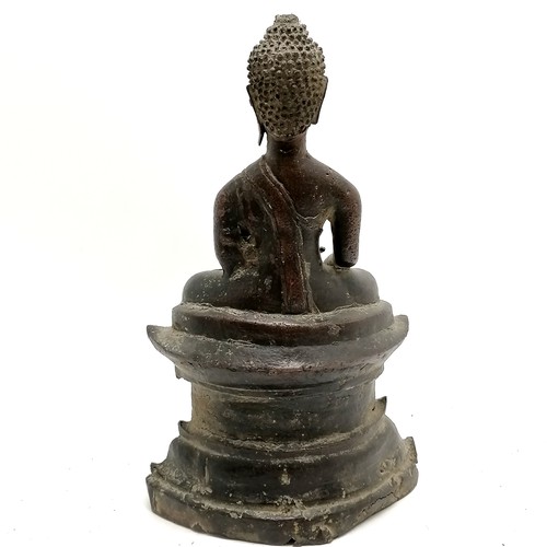 50 - 19th century or earlier bronze seated Buddha on raised pedestal / plinth - 28cm high & has losses to... 