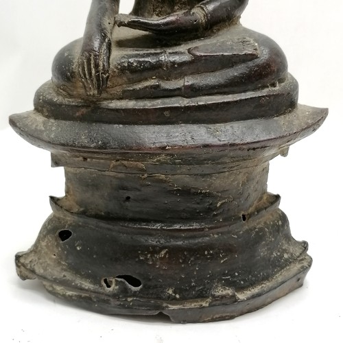 50 - 19th century or earlier bronze seated Buddha on raised pedestal / plinth - 28cm high & has losses to... 