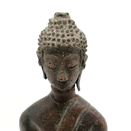 50 - 19th century or earlier bronze seated Buddha on raised pedestal / plinth - 28cm high & has losses to... 