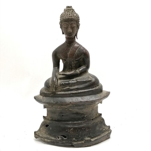 50 - 19th century or earlier bronze seated Buddha on raised pedestal / plinth - 28cm high & has losses to... 