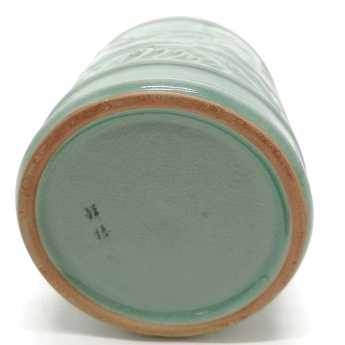 56 - Oriental crackle green glaze cylindrical pot with dragon detail - 11.5cm diameter x 11.5cm high with... 