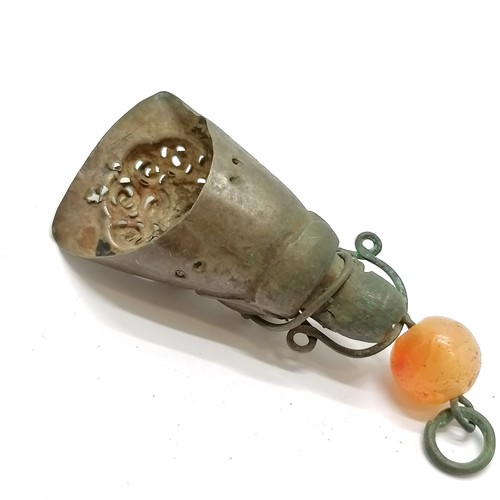 29 - Antique Chinese figural shaped metal finger decoration with cornelian bead detail - 6.5cm long