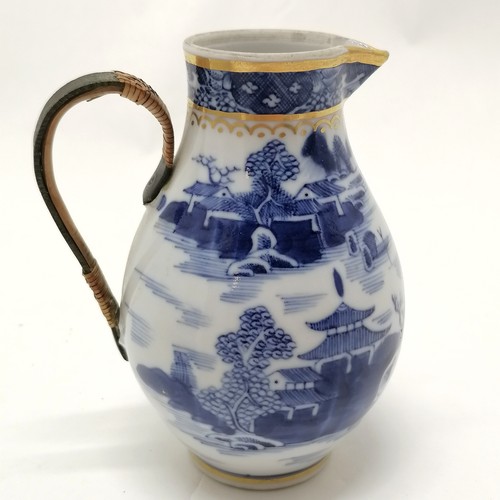 46 - 2 x Oriental Chinese blue & white ceramics - sparrow beak jug with tinker repair handle (11cm) & bow... 