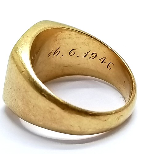 671 - 18ct marked gold armourial signet ring -size K & 10.5g ~ inscribed Jacky 16.6.1946 inside shank