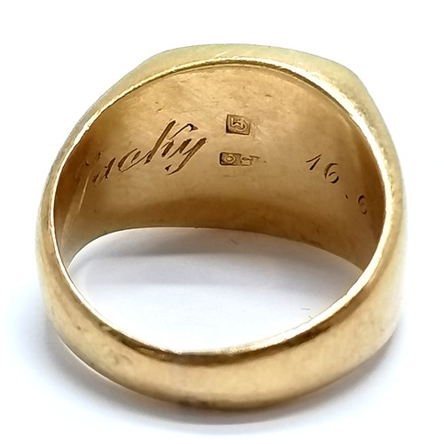 671 - 18ct marked gold armourial signet ring -size K & 10.5g ~ inscribed Jacky 16.6.1946 inside shank