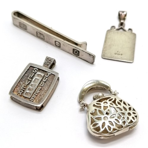 723 - Silver enamel and marcasite purse locket pendant (3cm drop) t/w silver jubilee 4 nations pendant, re... 