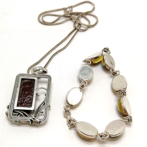 724 - Silver and amber set pendant (4.5cm drop) on silver chain + silver & amber set bracelet - 29g total ... 