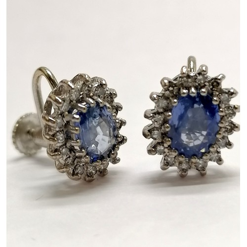 763 - Unmarked white gold cornflower sapphire and diamond cluster pair of earrings with screw on backs - 3... 