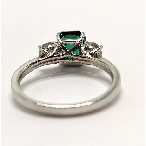 765 - 18ct hallmarked white gold emerald cut green tourmaline & diamond ring - size M & 3.3g total weight ... 