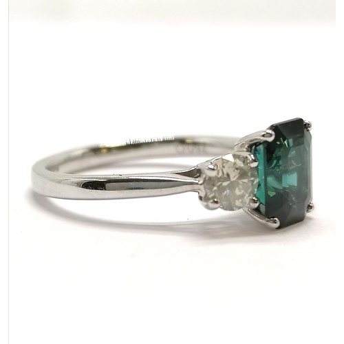 765 - 18ct hallmarked white gold emerald cut green tourmaline & diamond ring - size M & 3.3g total weight ... 