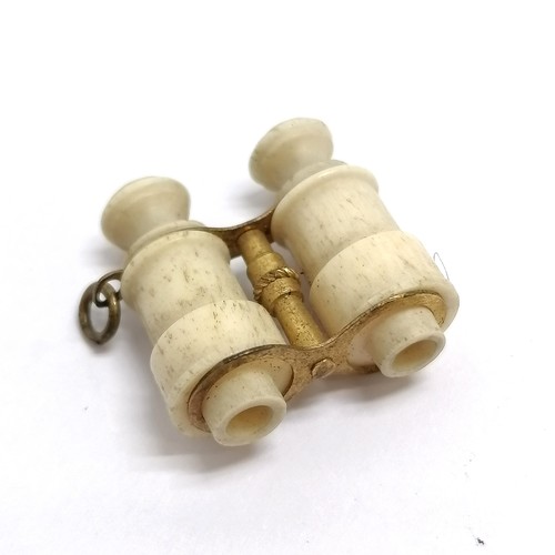 776 - Antique Serpentine compass fob 2.2cm long T/W carved bone binoculars as a fob - no lenses