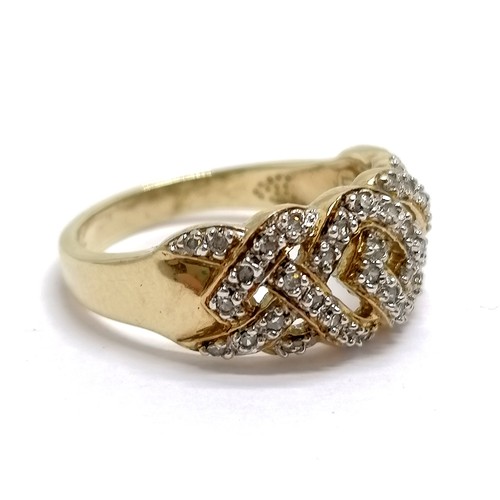 912 - 9ct hallmarked gold diamond stone set ring withe crossover detail - size P½ & 3.8g total weight