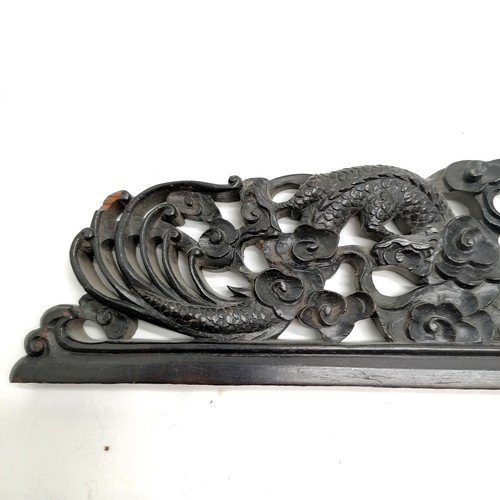 56 - Antique hand carved Chinese wooden frieze depicting 2 dragons and clouds - 83cm long & has 1 small l... 