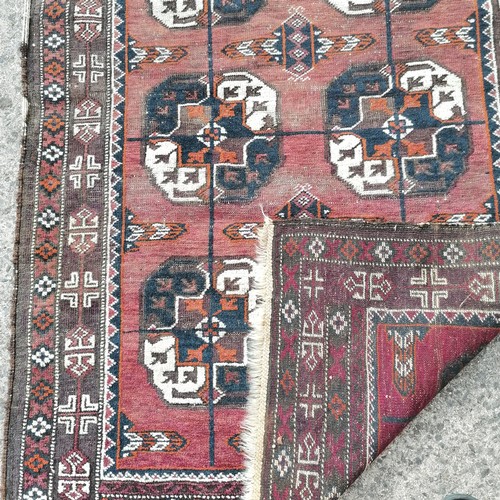 74 - Antique geometric patterned rug / runner with 14 medallion detail - 110cm x 310cm and has obvious we... 