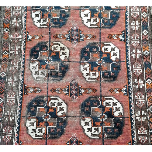 74 - Antique geometric patterned rug / runner with 14 medallion detail - 110cm x 310cm and has obvious we... 