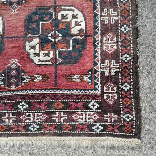 74 - Antique geometric patterned rug / runner with 14 medallion detail - 110cm x 310cm and has obvious we... 