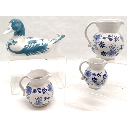 78 - Rye pottery model of a duck (26.5cm long) signed D T Sharp t/w 3 graduated decorated jugs (middle ju... 