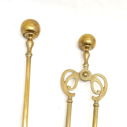 143 - Art Nouveau style brass 3 piece companion set (66cm long) ~ slight dents to spheres otherwise in goo... 