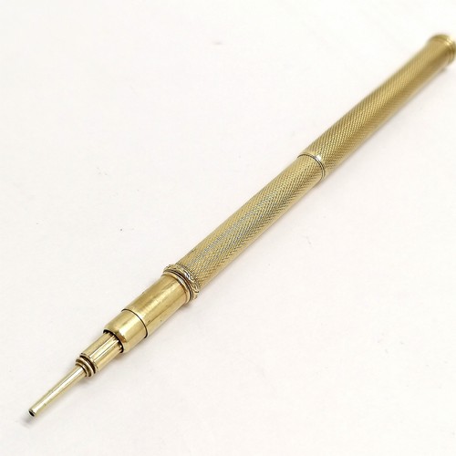 151 - Antique gold cased telescopic pencil/dip pen with black hardstone end, total lenghth 13.5cm, total w... 