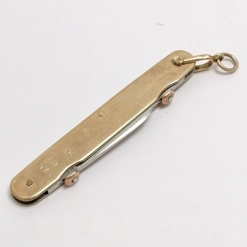 153 - Samuel Morden & Co. 9ct hallmarked Chester 1918 2 bladed penknife with 2 gold pull buttons to the bl... 